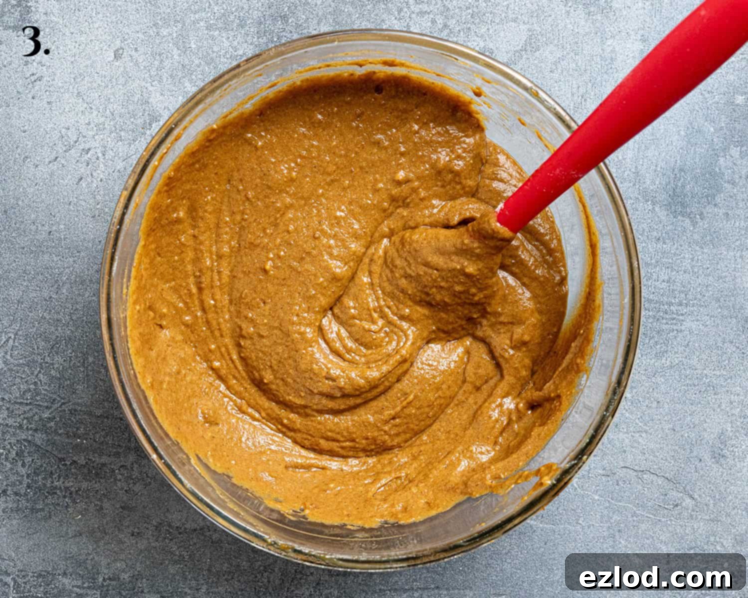 Spiced Pumpkin Sticky Toffee Pudding 7 Step 3: The rich, smooth batter for the pumpkin sticky toffee pudding in a large mixing bowl, ready to be poured into the baking tin.