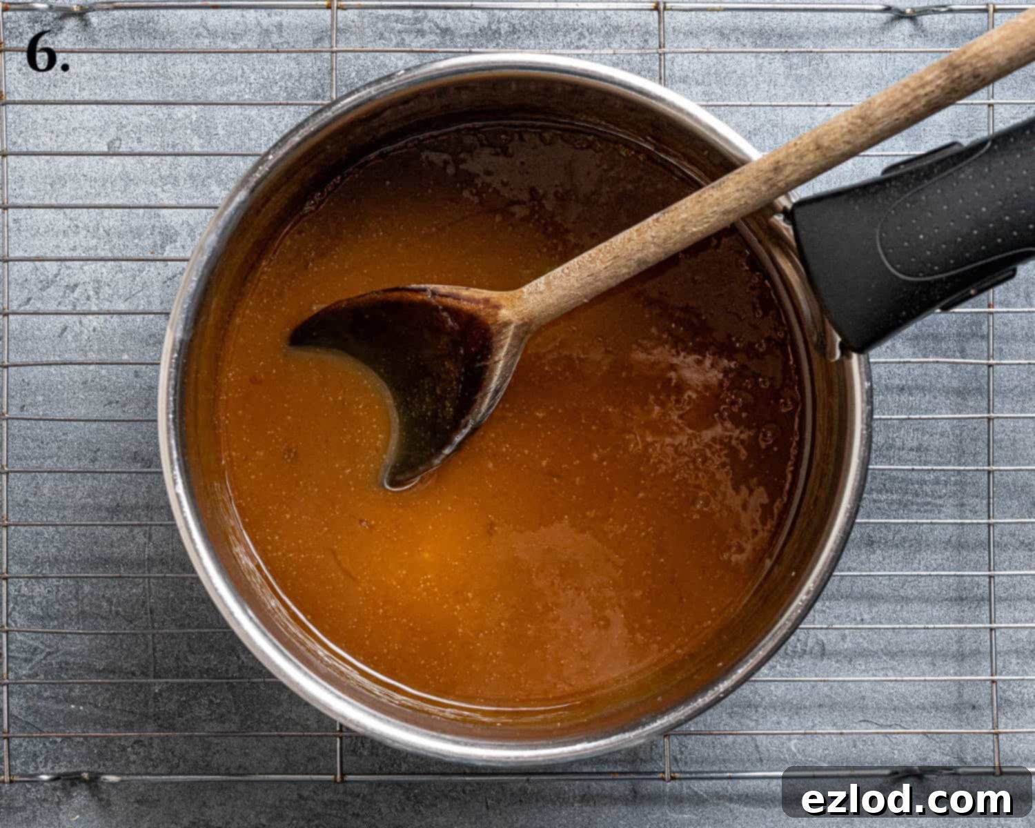 Spiced Pumpkin Sticky Toffee Pudding 10 Step 6: The rich, bubbling toffee sauce for the pudding being prepared in a saucepan, ready to be poured over the warm cake.