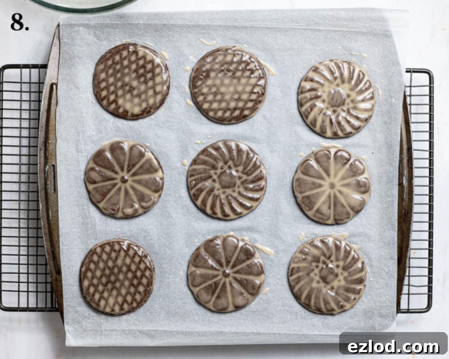 Step 8: The freshly glazed cookies, gleaming with festive cheer.