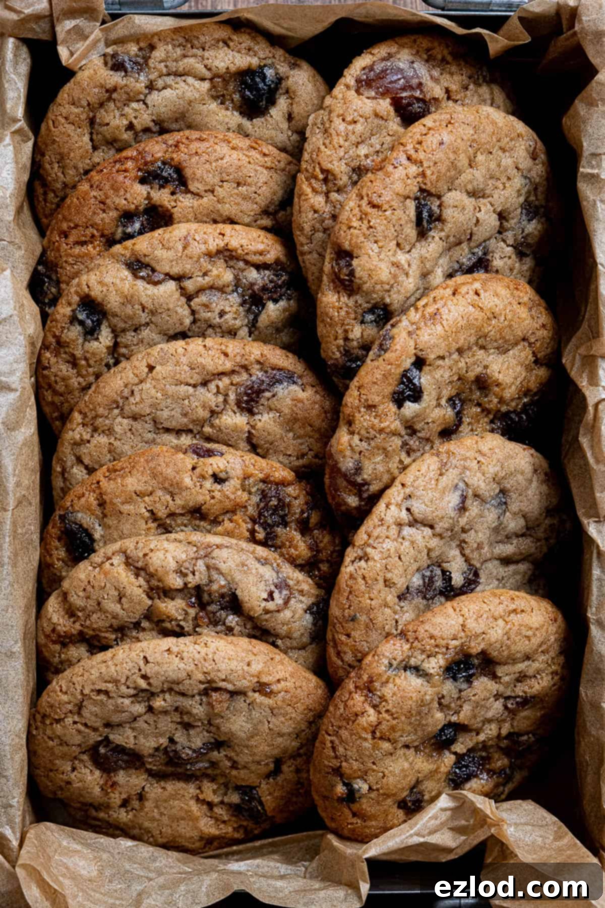 Close up of vegan mincemeat cookies in a parchment lined box.
