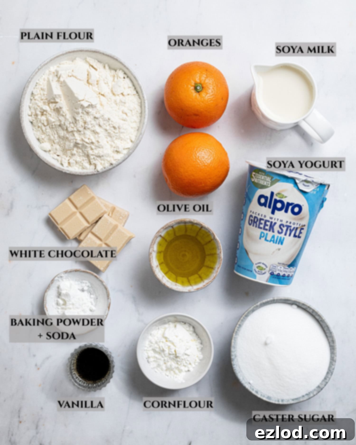 A labelled photo of the ingredients needed to make blood orange olive oil cake.