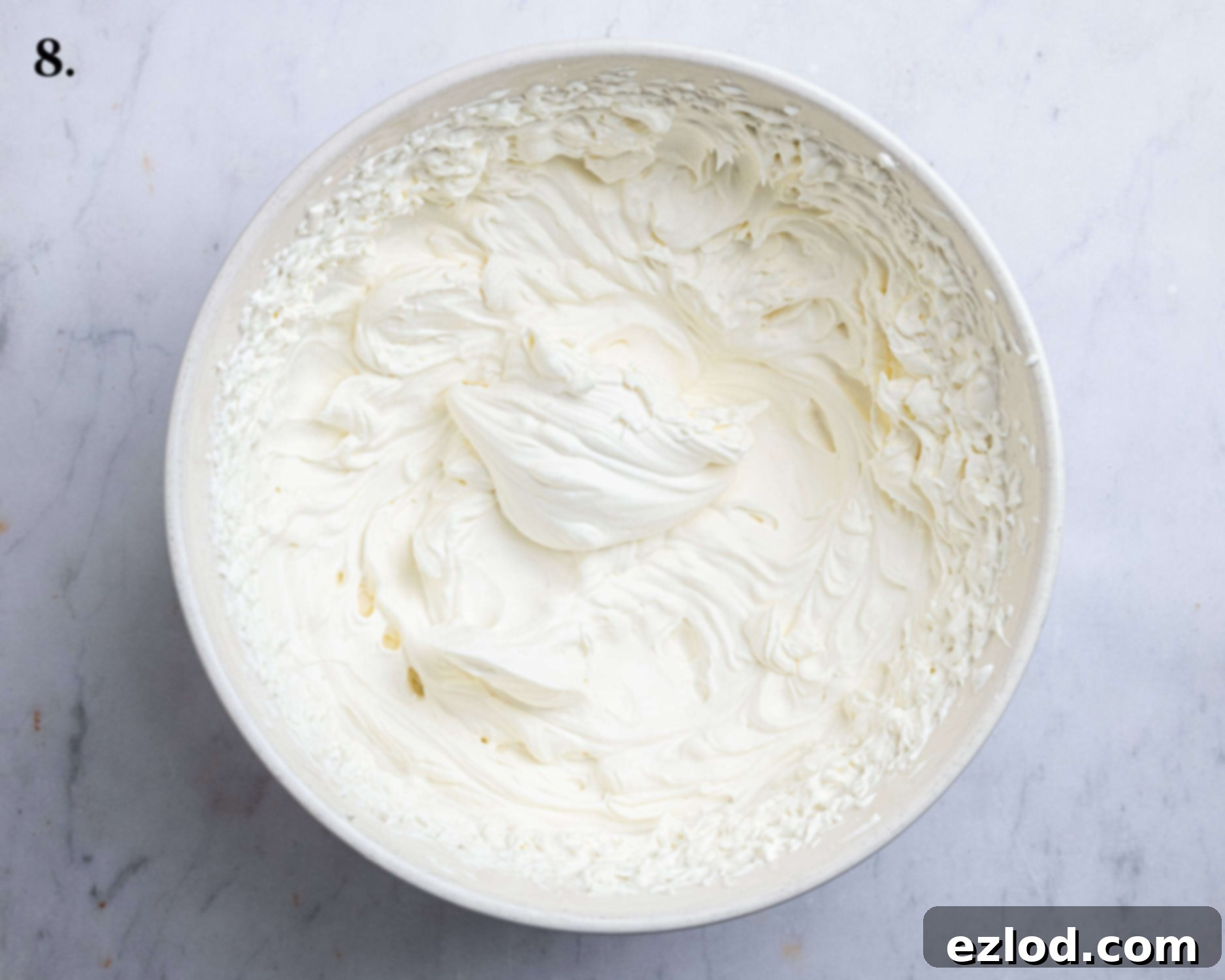 Vegan Dark Cherry Dream Trifle 12 Step 8, the whipped cream in a bowl.