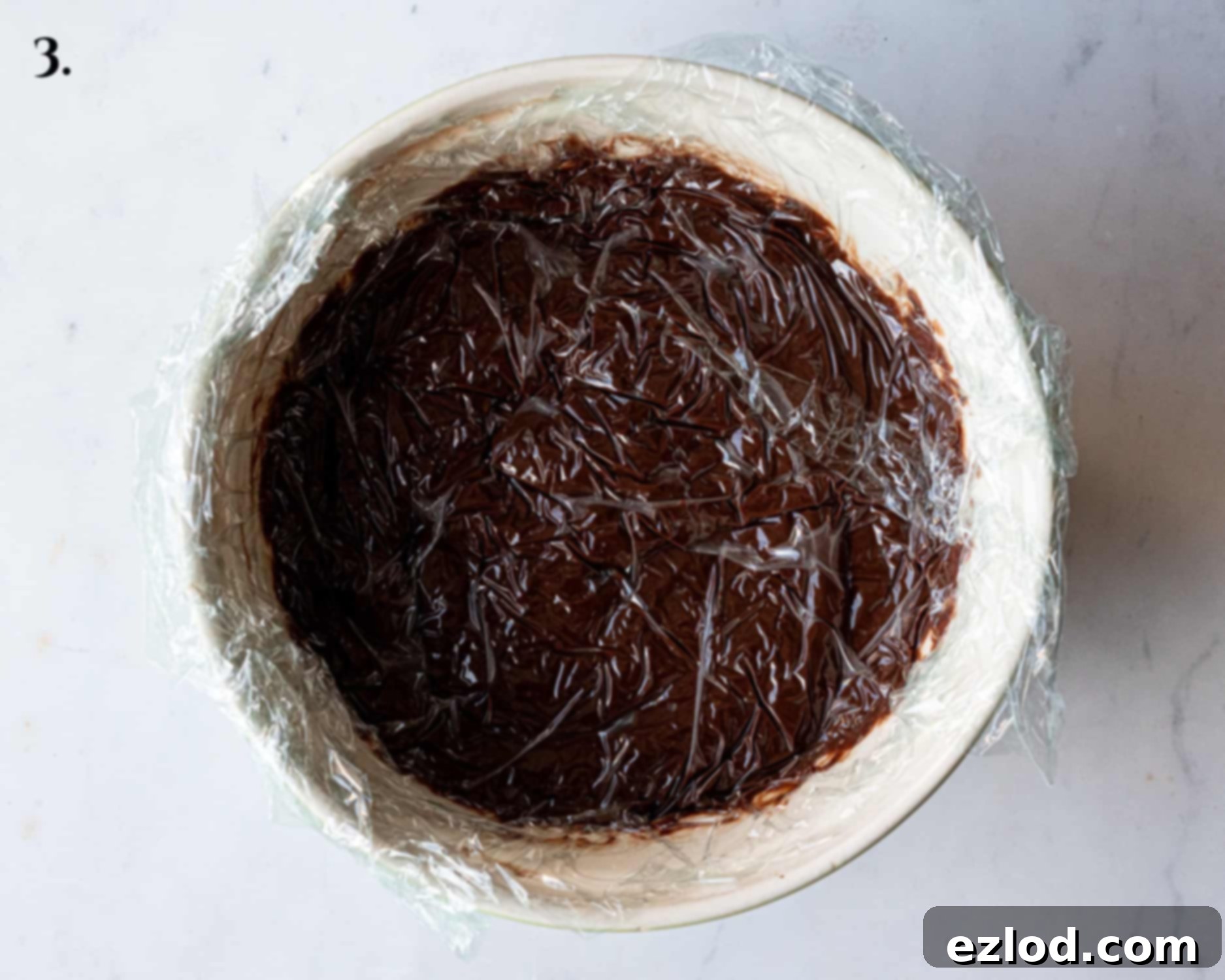 Vegan Dark Cherry Dream Trifle 7 Step 3, the clingfilm covered custard.