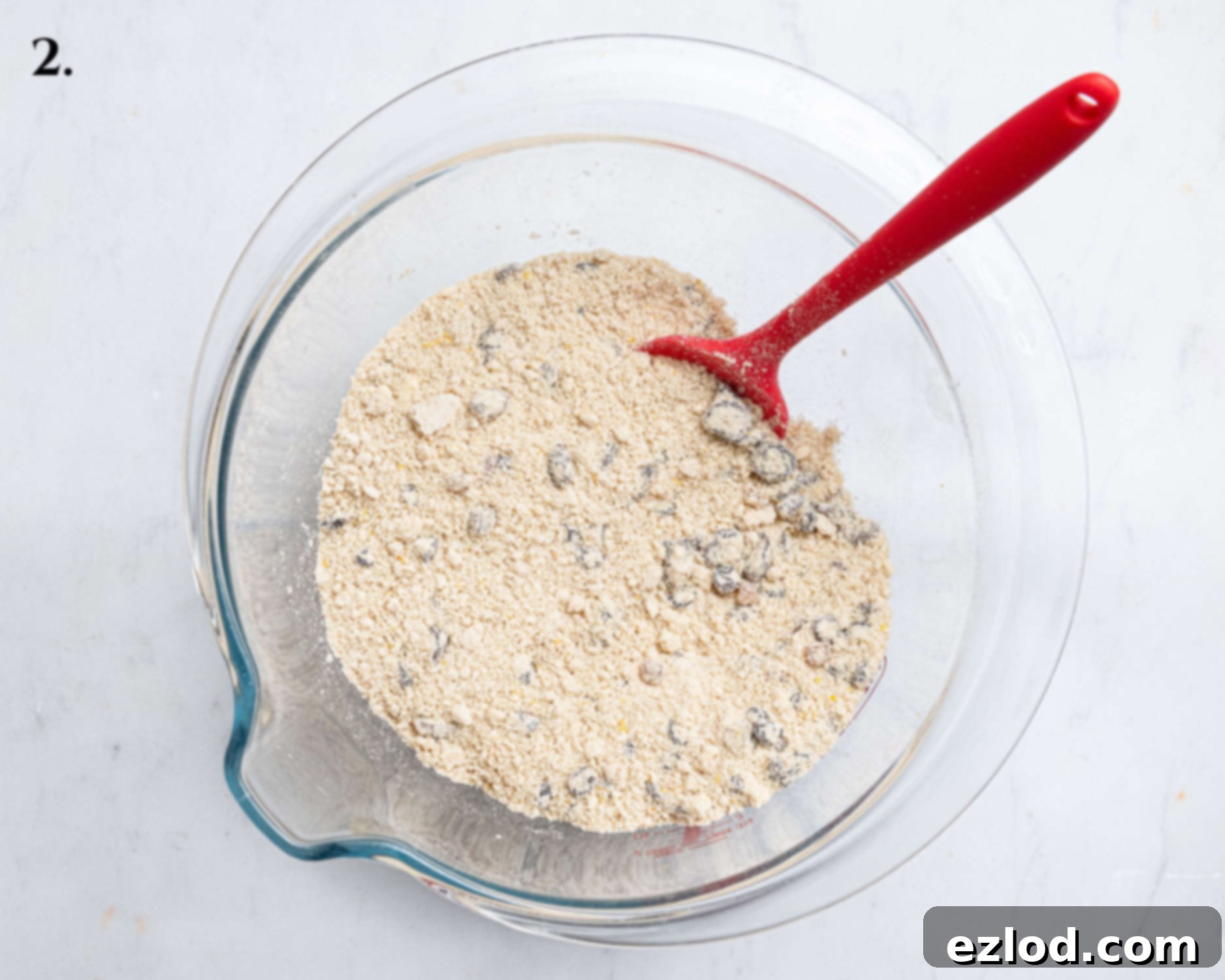 Dry ingredients with fruit and sugar mixed in.