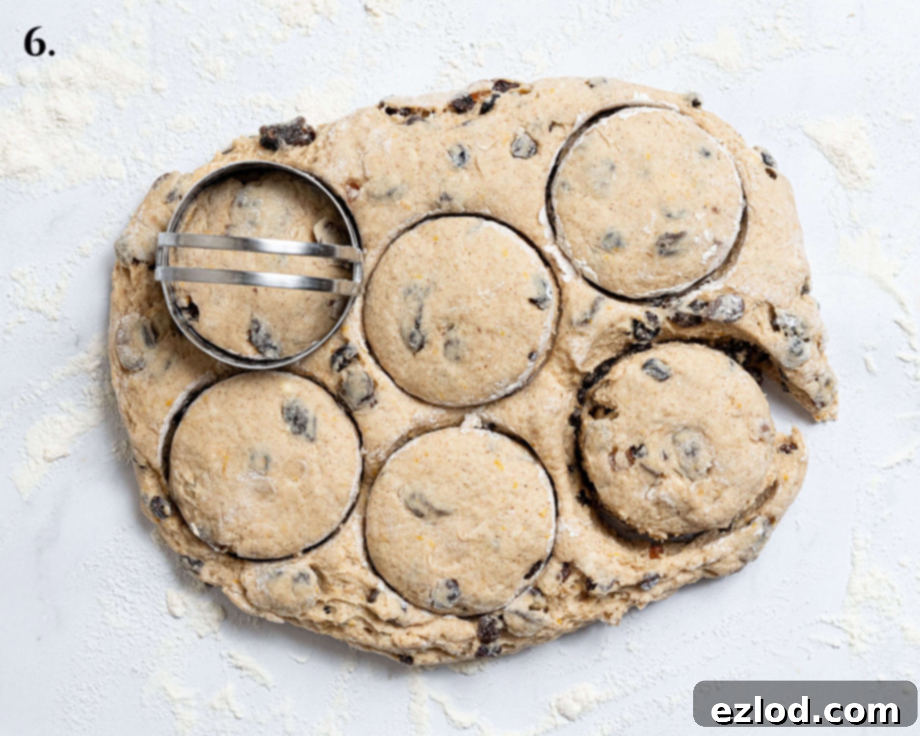 Cutting rounds out of the dough.